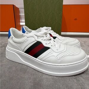 White Sneakers with Red and Black Stripes